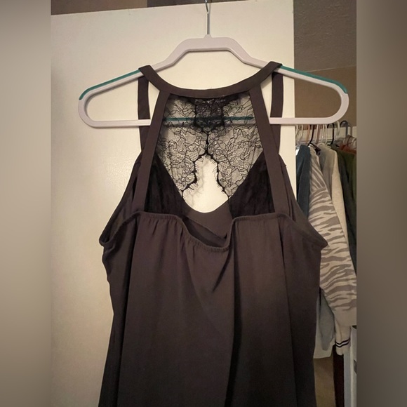 Dark grey sexy top with black lace back details. Size 0 but fits like a L. - Picture 2 of 3